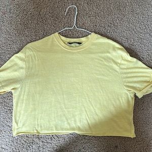 Yellow cropped shirt